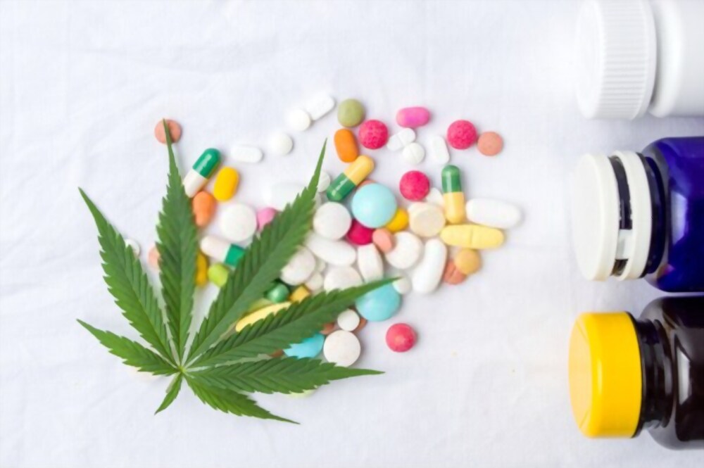 Marijuana leaf and pills